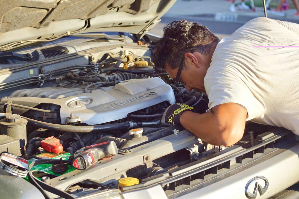 DIY Car Repair Tips and Tricks - Man Working UnDer The HooD Of A Car Trying To Fix The Problem Tonythetigersson Tony AnDrews T20 VKKkoG 1200x800